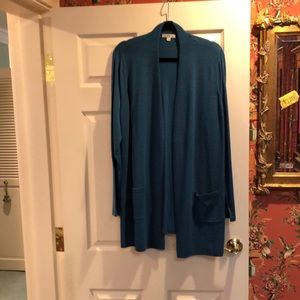 Open cardigan. Merino wool. Soft and luxurious.